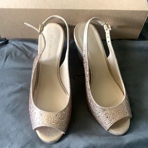 Rose gold coloured glitter wedges